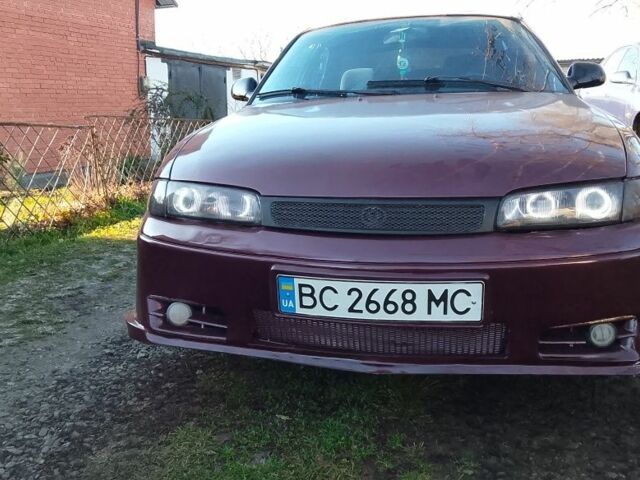 Красный Мазда 626, объемом двигателя 1.8 л и пробегом 300 тыс. км за 1700 $, фото 1 на Automoto.ua