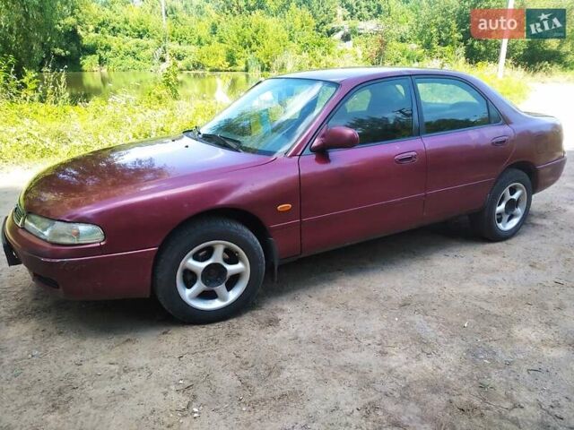 Красный Мазда 626, объемом двигателя 1.8 л и пробегом 400 тыс. км за 2300 $, фото 1 на Automoto.ua