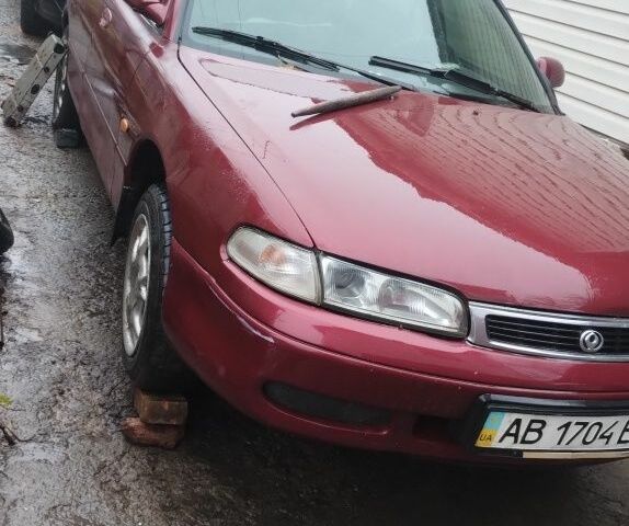 Красный Мазда 626, объемом двигателя 1.8 л и пробегом 400 тыс. км за 650 $, фото 1 на Automoto.ua