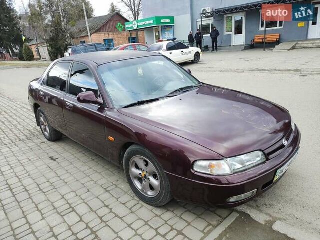 Красный Мазда 626, объемом двигателя 2 л и пробегом 300 тыс. км за 2200 $, фото 1 на Automoto.ua