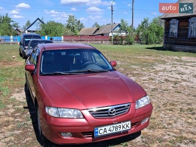 Красный Мазда 626, объемом двигателя 2 л и пробегом 300 тыс. км за 3250 $, фото 1 на Automoto.ua