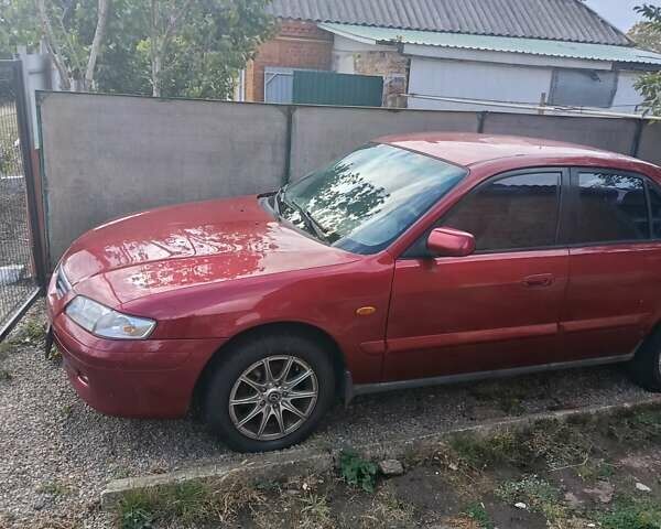 Красный Мазда 626, объемом двигателя 1.84 л и пробегом 34 тыс. км за 2500 $, фото 1 на Automoto.ua