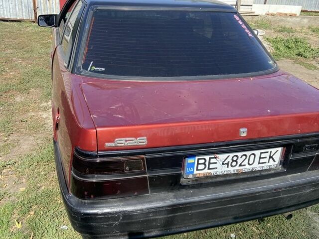 Червоний Мазда 626, об'ємом двигуна 2 л та пробігом 310 тис. км за 1150 $, фото 1 на Automoto.ua