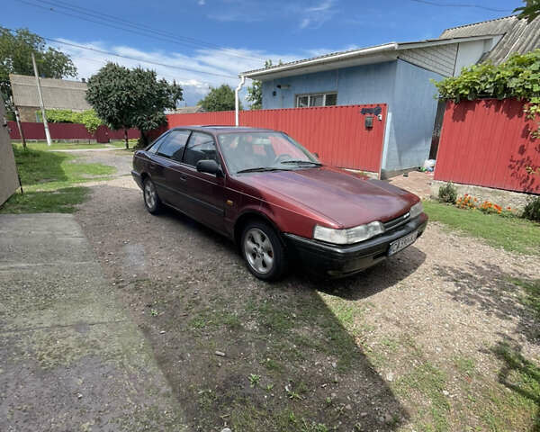 Червоний Мазда 626, об'ємом двигуна 2 л та пробігом 235 тис. км за 1600 $, фото 1 на Automoto.ua