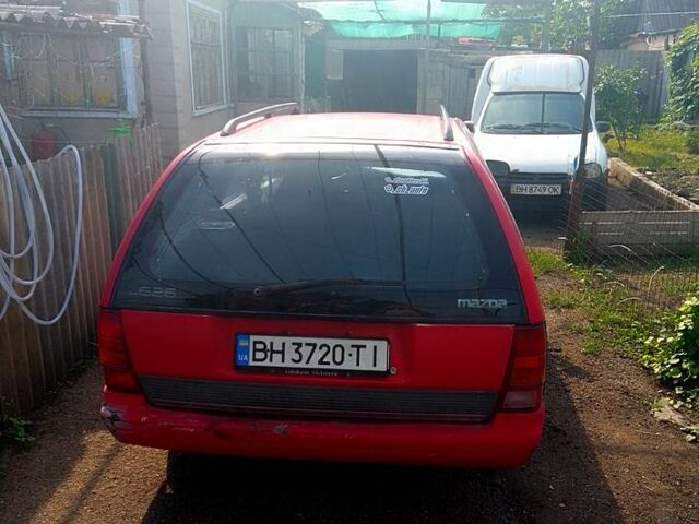 Красный Мазда 626, объемом двигателя 2.2 л и пробегом 343 тыс. км за 1550 $, фото 1 на Automoto.ua