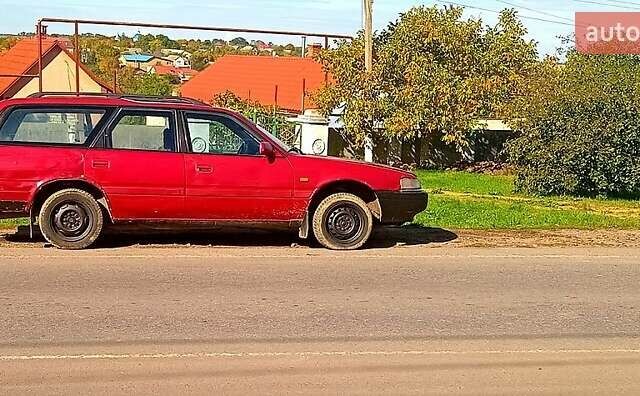 Красный Мазда 626, объемом двигателя 2 л и пробегом 23 тыс. км за 700 $, фото 1 на Automoto.ua