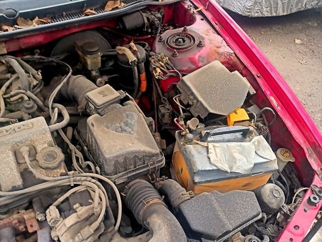 Красный Мазда 626, объемом двигателя 2 л и пробегом 247 тыс. км за 940 $, фото 1 на Automoto.ua