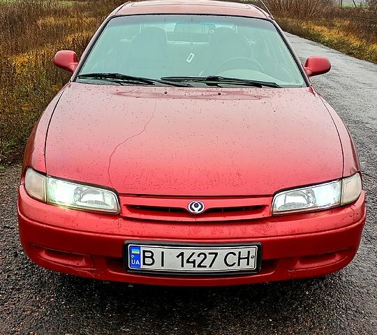 Красный Мазда 626, объемом двигателя 1.8 л и пробегом 33 тыс. км за 1500 $, фото 1 на Automoto.ua