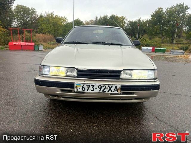 Мазда 626, объемом двигателя 2 л и пробегом 300 тыс. км за 1000 $, фото 1 на Automoto.ua