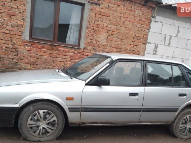 Серый Мазда 626, объемом двигателя 2 л и пробегом 500 тыс. км за 1000 $, фото 1 на Automoto.ua