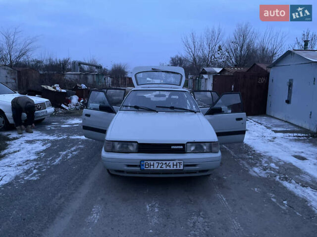 Серый Мазда 626, объемом двигателя 2 л и пробегом 301 тыс. км за 550 $, фото 1 на Automoto.ua