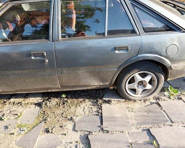 Серый Мазда 626, объемом двигателя 2 л и пробегом 200 тыс. км за 500 $, фото 1 на Automoto.ua