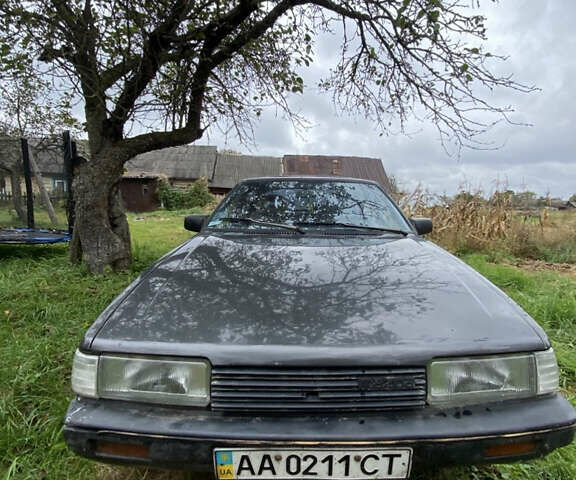 Серый Мазда 626, объемом двигателя 2 л и пробегом 30 тыс. км за 600 $, фото 1 на Automoto.ua