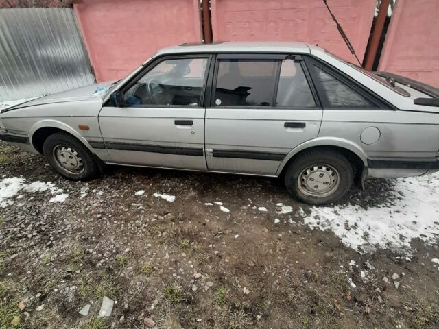 Серый Мазда 626, объемом двигателя 2 л и пробегом 310 тыс. км за 1 $, фото 1 на Automoto.ua