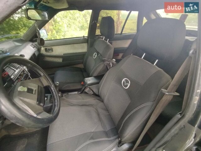 Серый Мазда 626, объемом двигателя 2 л и пробегом 149 тыс. км за 1400 $, фото 1 на Automoto.ua
