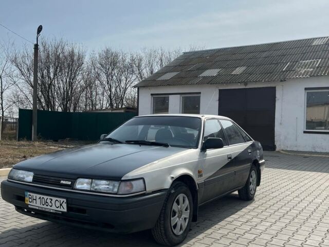 Сірий Мазда 626, об'ємом двигуна 2 л та пробігом 245 тис. км за 1400 $, фото 1 на Automoto.ua