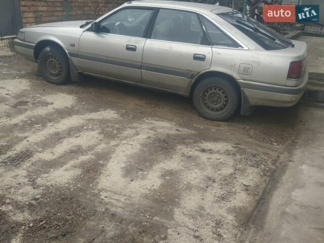 Сірий Мазда 626, об'ємом двигуна 2 л та пробігом 280 тис. км за 1000 $, фото 1 на Automoto.ua