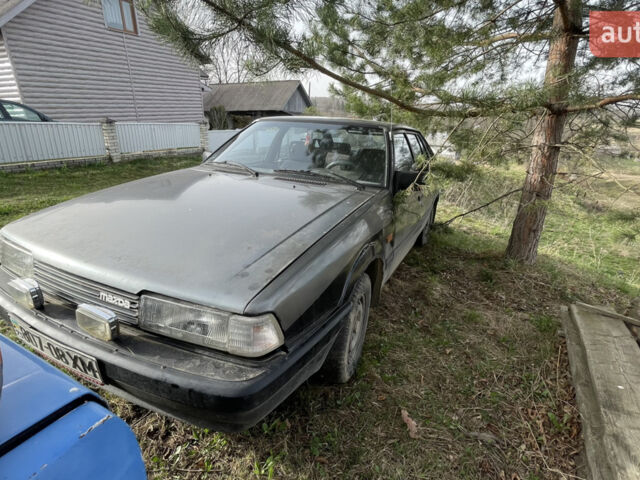 Серый Мазда 626, объемом двигателя 2 л и пробегом 435 тыс. км за 700 $, фото 1 на Automoto.ua