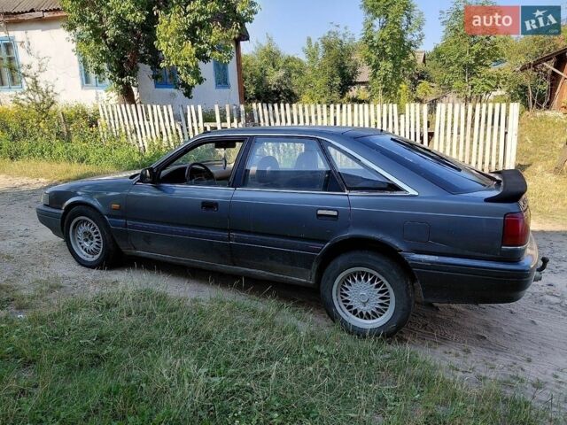Сірий Мазда 626, об'ємом двигуна 2 л та пробігом 300 тис. км за 902 $, фото 1 на Automoto.ua