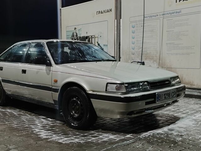 Серый Мазда 626, объемом двигателя 2 л и пробегом 332 тыс. км за 750 $, фото 1 на Automoto.ua