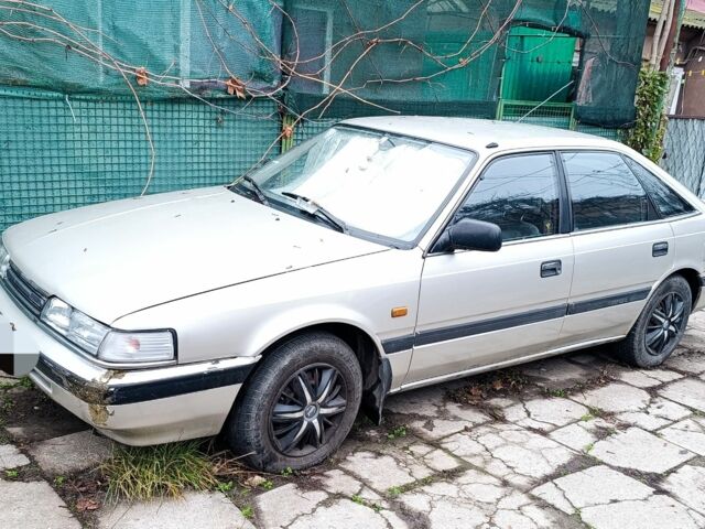 Серый Мазда 626, объемом двигателя 2 л и пробегом 350 тыс. км за 1200 $, фото 1 на Automoto.ua