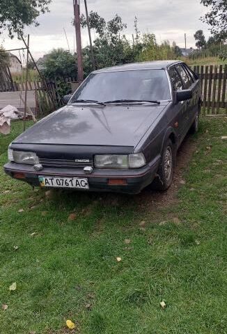 Серый Мазда 626, объемом двигателя 2 л и пробегом 210 тыс. км за 1000 $, фото 1 на Automoto.ua