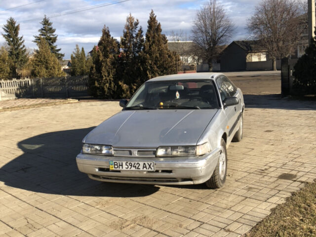Серый Мазда 626, объемом двигателя 2 л и пробегом 250 тыс. км за 1300 $, фото 1 на Automoto.ua