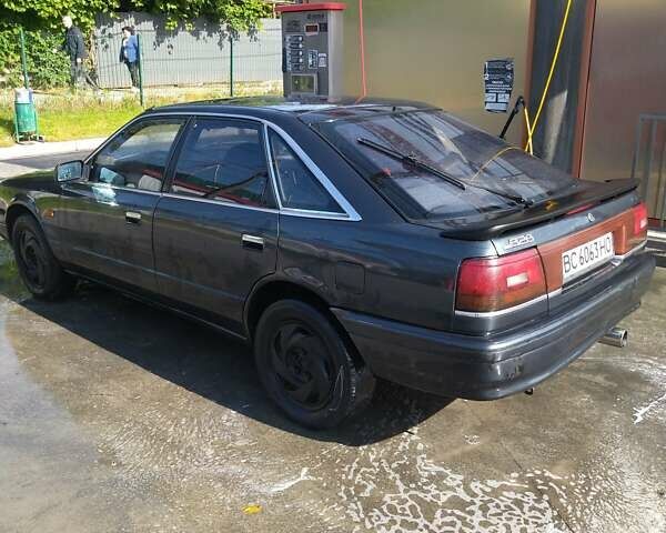 Сірий Мазда 626, об'ємом двигуна 2 л та пробігом 325 тис. км за 1400 $, фото 1 на Automoto.ua