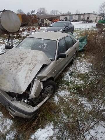 Серый Мазда 626, объемом двигателя 2 л и пробегом 400 тыс. км за 500 $, фото 1 на Automoto.ua