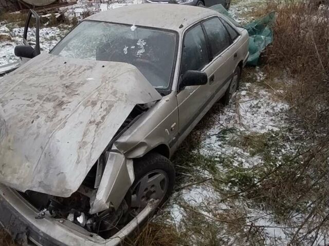 Серый Мазда 626, объемом двигателя 2 л и пробегом 400 тыс. км за 500 $, фото 1 на Automoto.ua