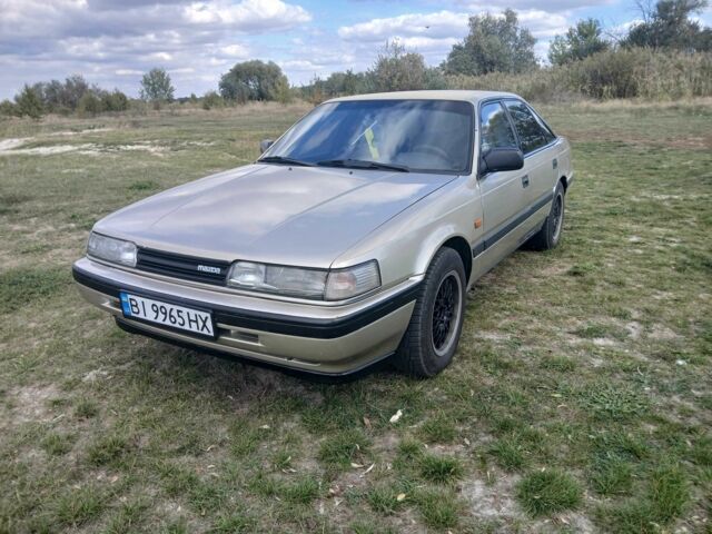 Серый Мазда 626, объемом двигателя 2 л и пробегом 320 тыс. км за 2022 $, фото 1 на Automoto.ua