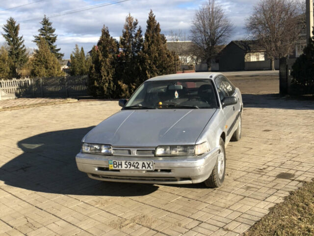 Серый Мазда 626, объемом двигателя 2 л и пробегом 250 тыс. км за 1300 $, фото 1 на Automoto.ua