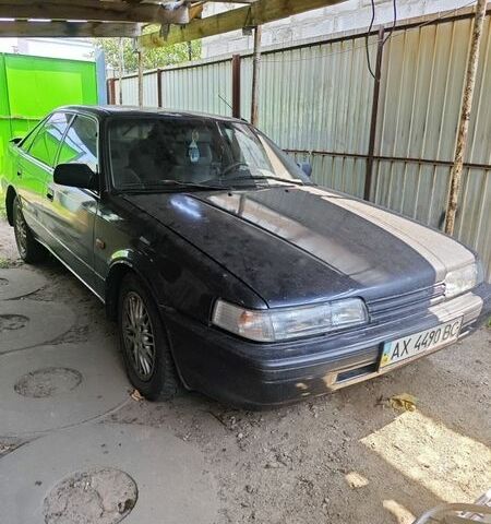 Серый Мазда 626, объемом двигателя 2 л и пробегом 390 тыс. км за 1575 $, фото 1 на Automoto.ua