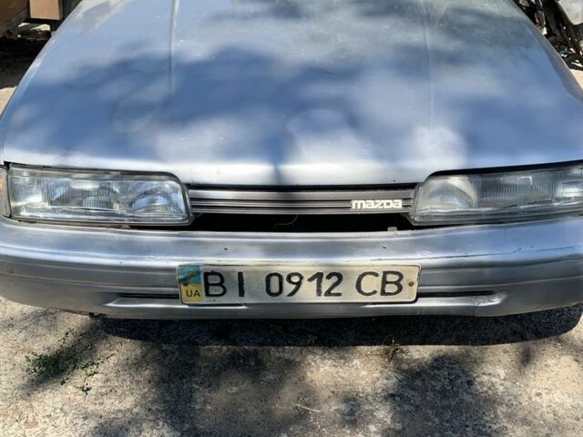 Серый Мазда 626, объемом двигателя 2 л и пробегом 300 тыс. км за 500 $, фото 1 на Automoto.ua