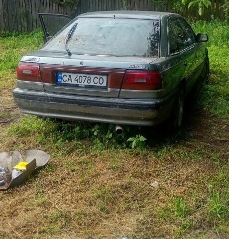 Серый Мазда 626, объемом двигателя 2.2 л и пробегом 420 тыс. км за 448 $, фото 1 на Automoto.ua