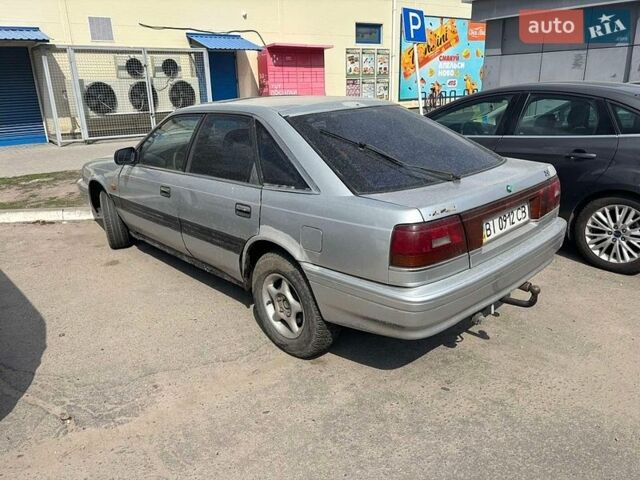 Серый Мазда 626, объемом двигателя 2 л и пробегом 350 тыс. км за 400 $, фото 1 на Automoto.ua