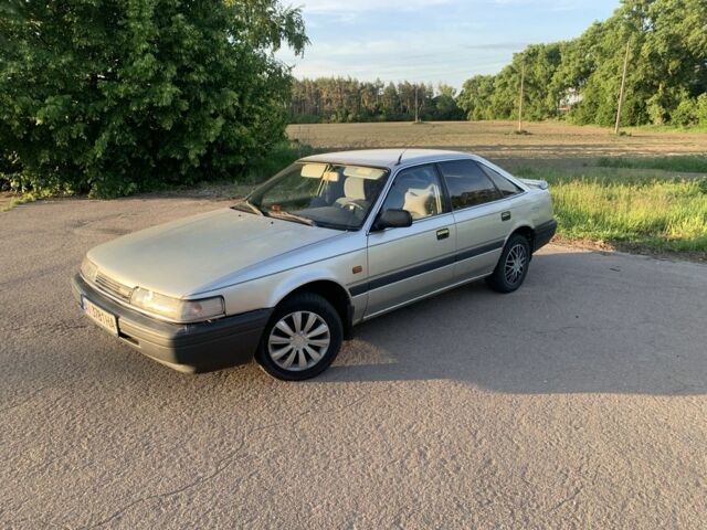 Сірий Мазда 626, об'ємом двигуна 2 л та пробігом 308 тис. км за 1000 $, фото 1 на Automoto.ua