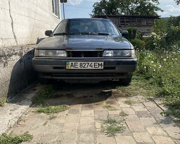 Серый Мазда 626, объемом двигателя 2 л и пробегом 540 тыс. км за 1000 $, фото 1 на Automoto.ua