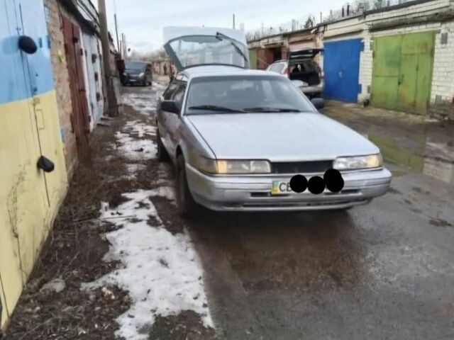 Сірий Мазда 626, об'ємом двигуна 2 л та пробігом 300 тис. км за 100 $, фото 1 на Automoto.ua