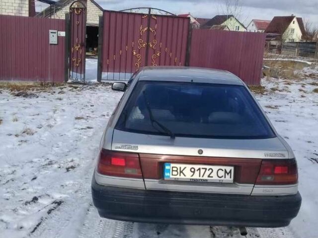 Серый Мазда 626, объемом двигателя 2 л и пробегом 360 тыс. км за 1000 $, фото 1 на Automoto.ua