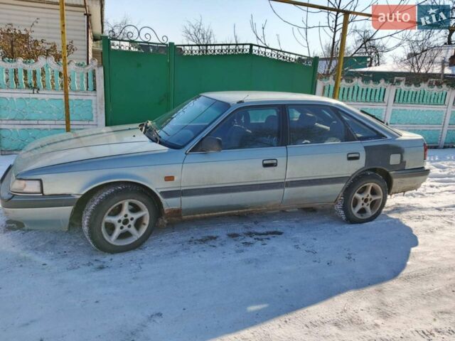 Серый Мазда 626, объемом двигателя 2 л и пробегом 300 тыс. км за 1100 $, фото 1 на Automoto.ua