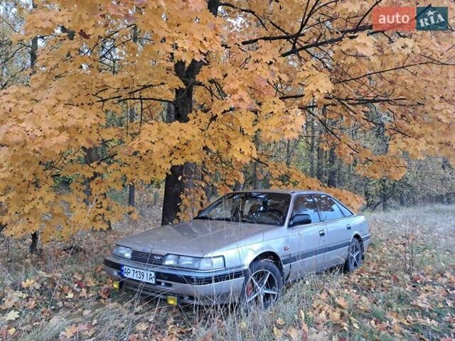 Сірий Мазда 626, об'ємом двигуна 2 л та пробігом 471 тис. км за 1250 $, фото 1 на Automoto.ua