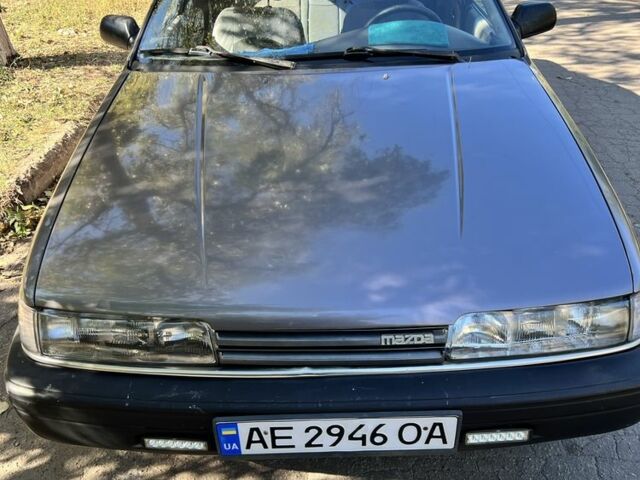 Сірий Мазда 626, об'ємом двигуна 2 л та пробігом 387 тис. км за 690 $, фото 1 на Automoto.ua