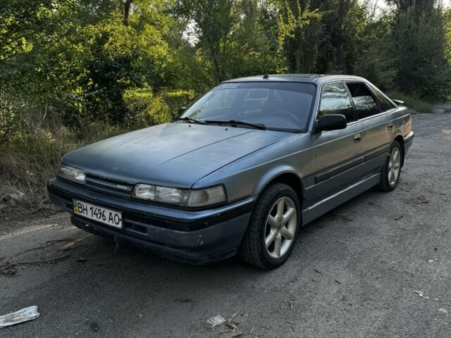 Серый Мазда 626, объемом двигателя 2 л и пробегом 300 тыс. км за 901 $, фото 1 на Automoto.ua