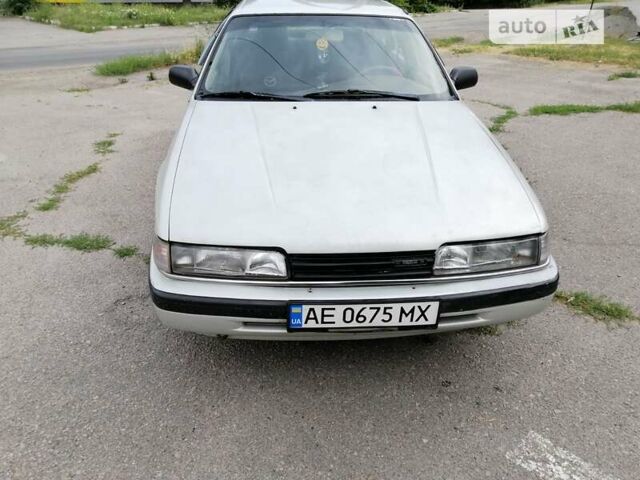 Серый Мазда 626, объемом двигателя 2 л и пробегом 245 тыс. км за 1700 $, фото 1 на Automoto.ua