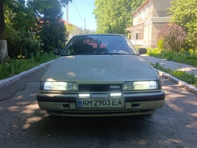 Серый Мазда 626, объемом двигателя 2 л и пробегом 200 тыс. км за 850 $, фото 1 на Automoto.ua