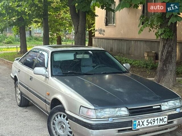 Серый Мазда 626, объемом двигателя 2 л и пробегом 430 тыс. км за 837 $, фото 1 на Automoto.ua