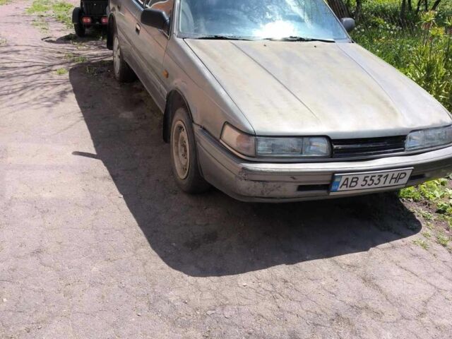 Серый Мазда 626, объемом двигателя 2 л и пробегом 200 тыс. км за 600 $, фото 1 на Automoto.ua