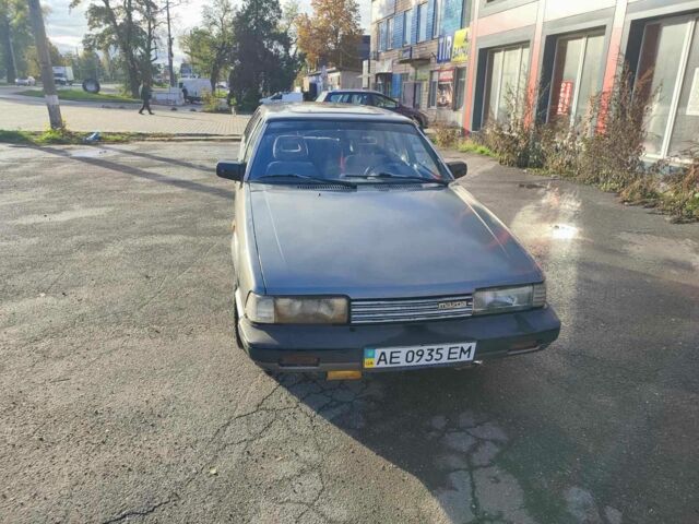 Серый Мазда 626, объемом двигателя 2 л и пробегом 200 тыс. км за 750 $, фото 1 на Automoto.ua