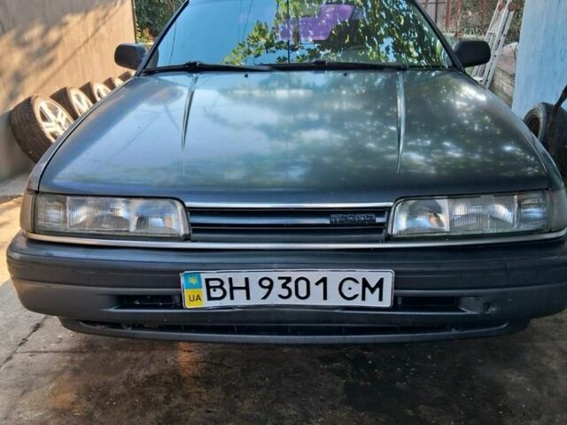 Серый Мазда 626, объемом двигателя 2 л и пробегом 220 тыс. км за 1300 $, фото 1 на Automoto.ua